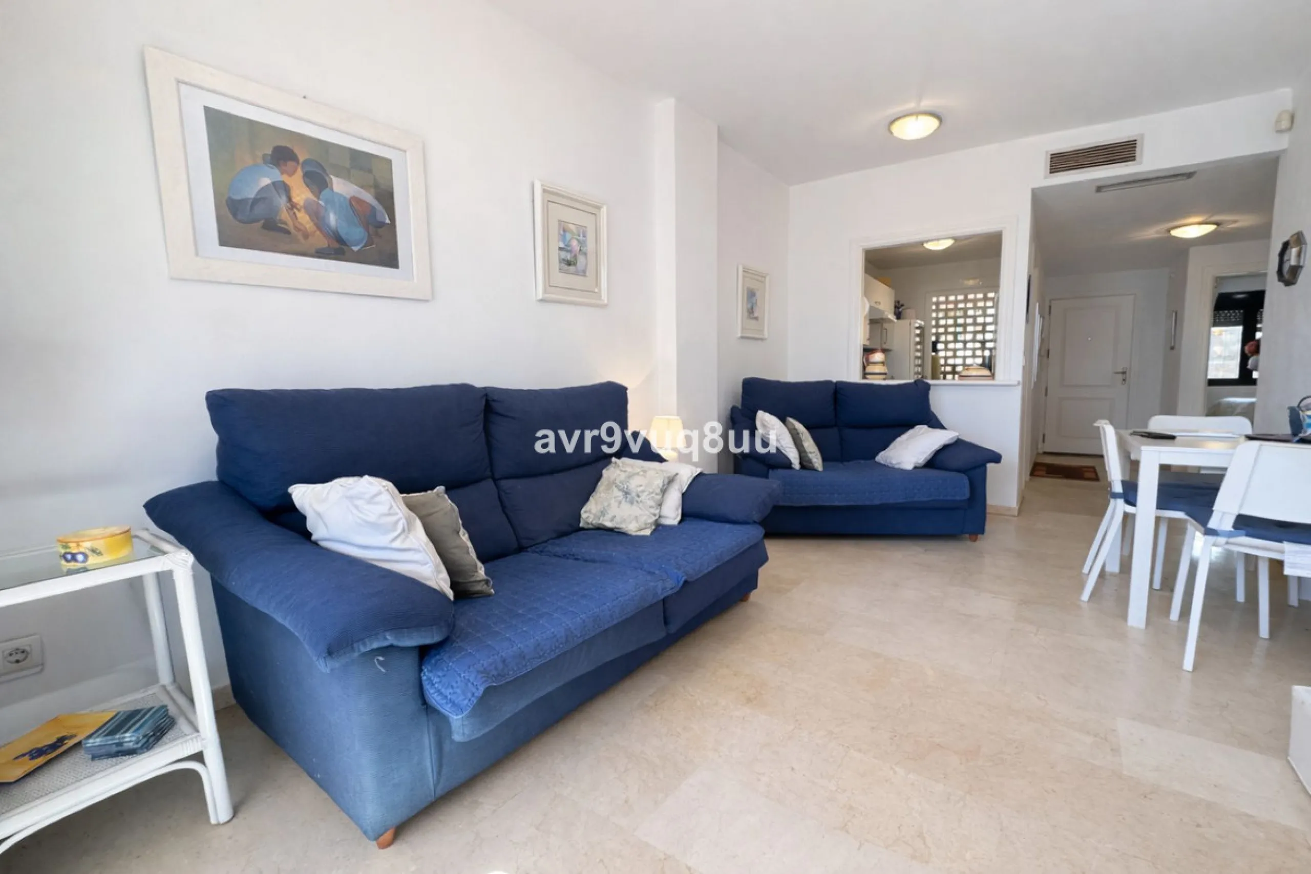 Ground floor apartment in a well established complex in the heart of Riviera del Sol. Large bright lounge diner with access to the closed sunny terrace and large private garden.  Views over the communal gardens and paddle courts. Ample bedrooms with built