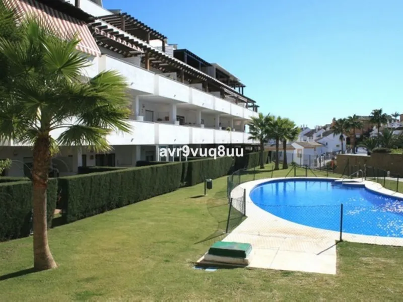 Ground floor apartment in a well established complex in the heart of Riviera del Sol. Large bright lounge diner with access to the closed sunny terrace and large private garden.  Views over the communal gardens and paddle courts. Ample bedrooms with built