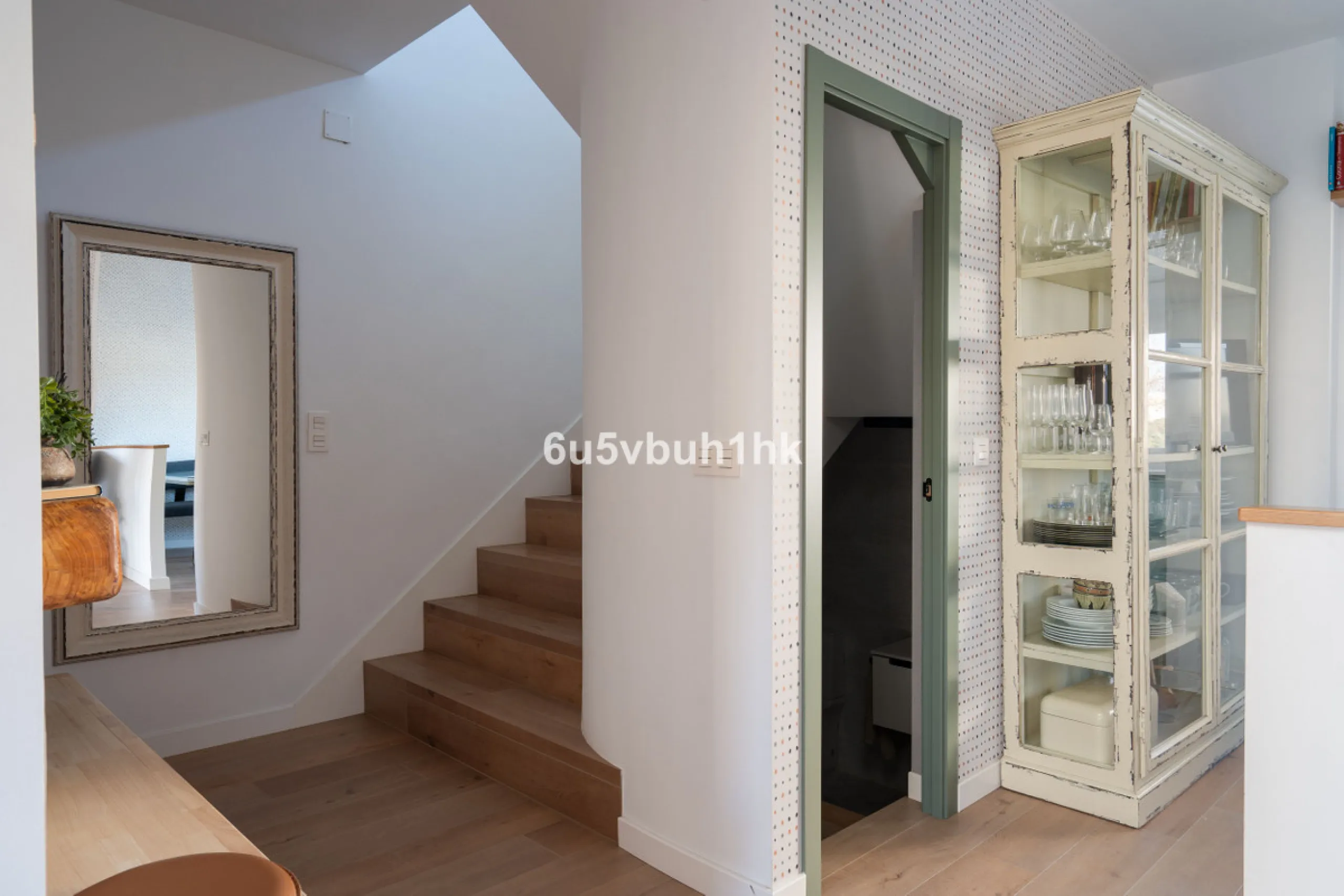 Discover a rare opportunity to own two beautifully designed homes combined on one generous plot in the heart of Vélez-Málaga — complete with private parking, a swimming pool, extensive entertainment areas, and a substantial commercial premise generating €