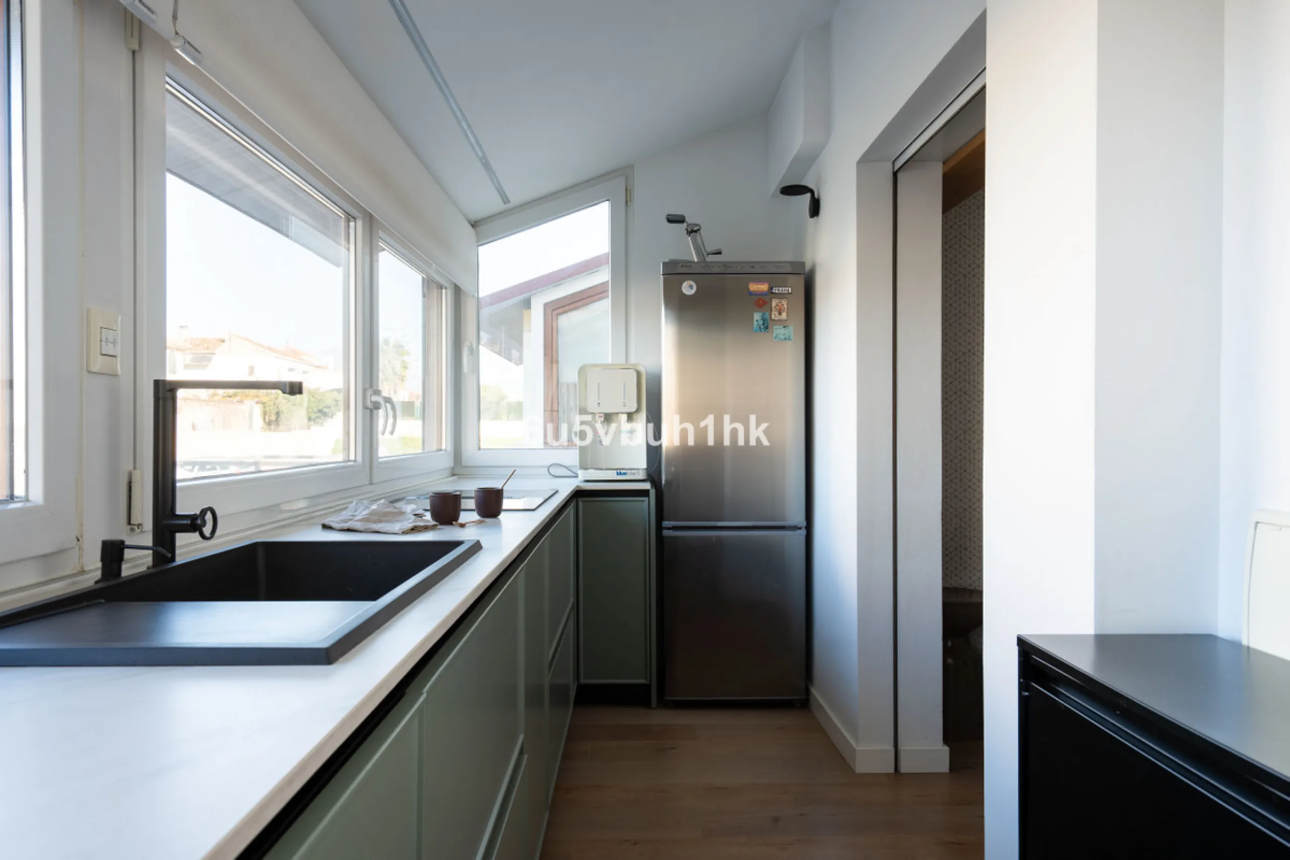 Discover a rare opportunity to own two beautifully designed homes combined on one generous plot in the heart of Vélez-Málaga — complete with private parking, a swimming pool, extensive entertainment areas, and a substantial commercial premise generating €