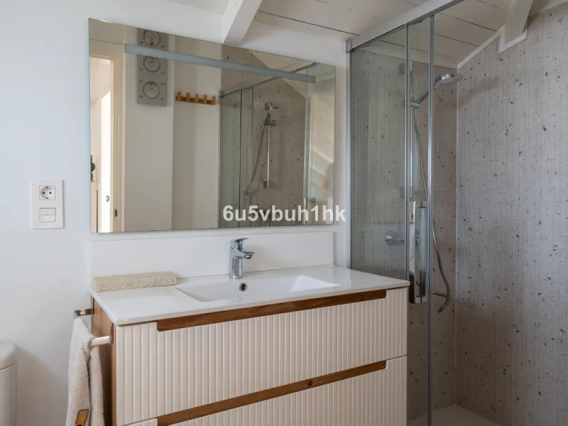 Discover a rare opportunity to own two beautifully designed homes combined on one generous plot in the heart of Vélez-Málaga — complete with private parking, a swimming pool, extensive entertainment areas, and a substantial commercial premise generating €
