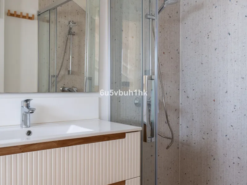Discover a rare opportunity to own two beautifully designed homes combined on one generous plot in the heart of Vélez-Málaga — complete with private parking, a swimming pool, extensive entertainment areas, and a substantial commercial premise generating €