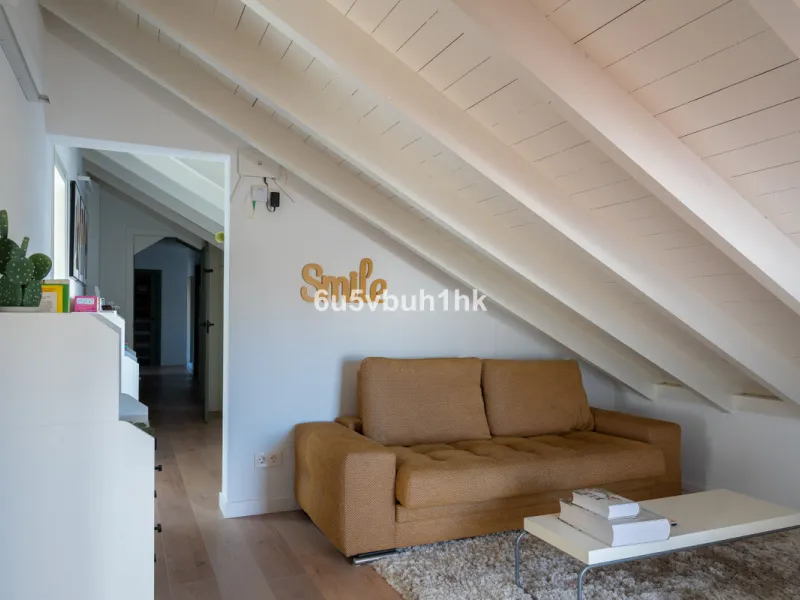 Discover a rare opportunity to own two beautifully designed homes combined on one generous plot in the heart of Vélez-Málaga — complete with private parking, a swimming pool, extensive entertainment areas, and a substantial commercial premise generating €