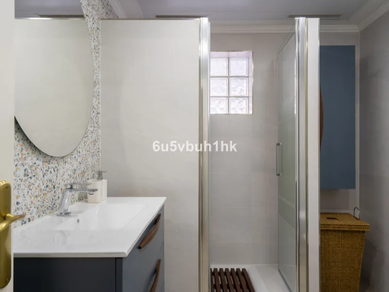 Discover a rare opportunity to own two beautifully designed homes combined on one generous plot in the heart of Vélez-Málaga — complete with private parking, a swimming pool, extensive entertainment areas, and a substantial commercial premise generating €