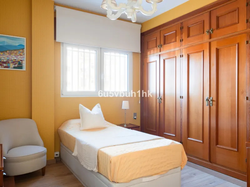 Discover a rare opportunity to own two beautifully designed homes combined on one generous plot in the heart of Vélez-Málaga — complete with private parking, a swimming pool, extensive entertainment areas, and a substantial commercial premise generating €