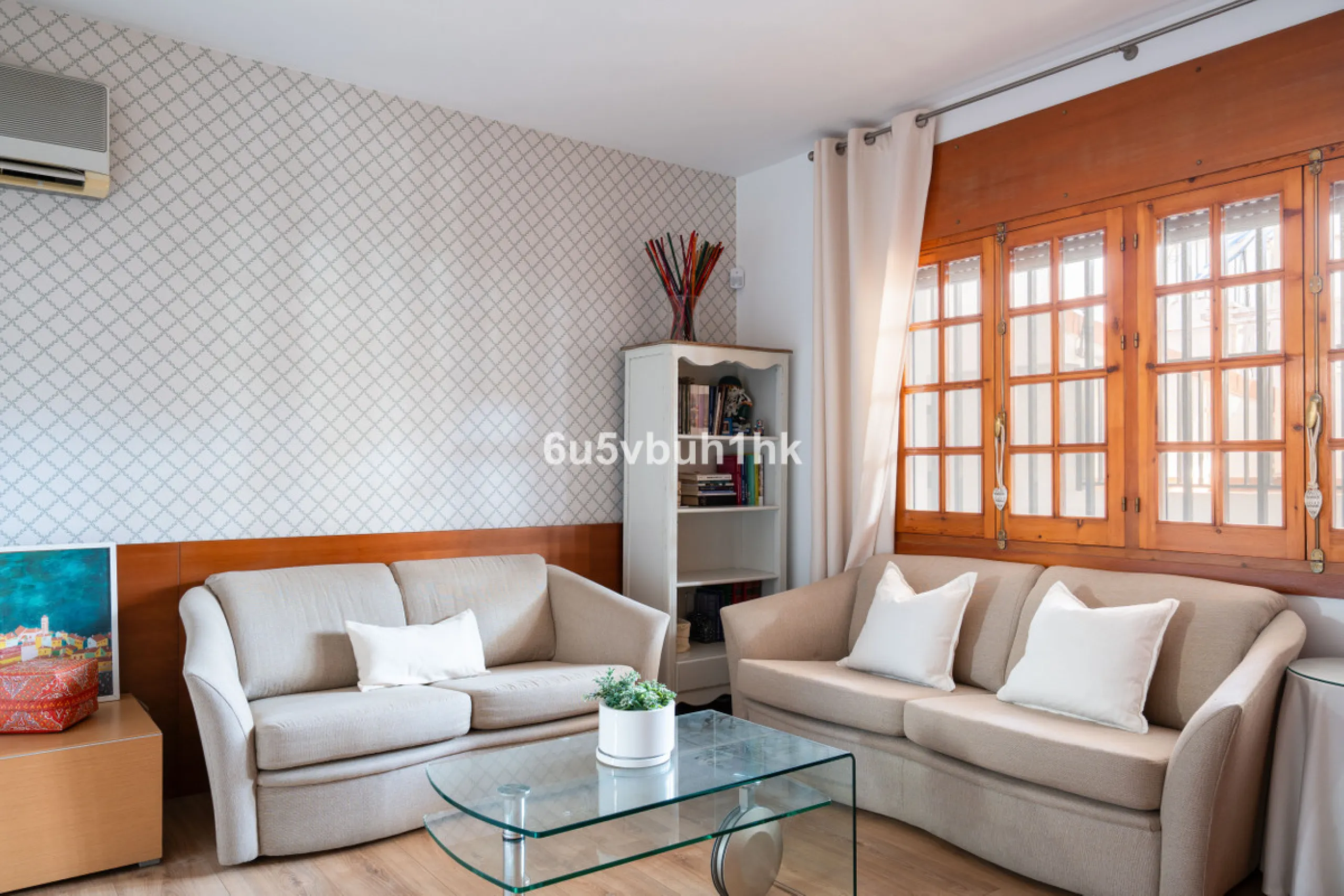 Discover a rare opportunity to own two beautifully designed homes combined on one generous plot in the heart of Vélez-Málaga — complete with private parking, a swimming pool, extensive entertainment areas, and a substantial commercial premise generating €