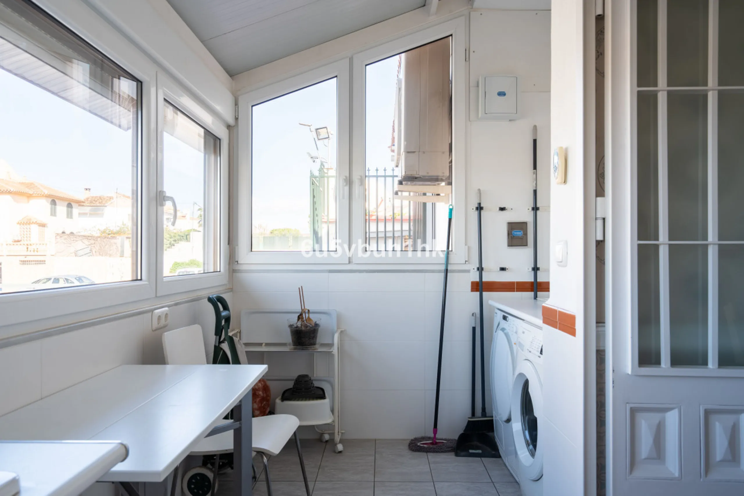 Discover a rare opportunity to own two beautifully designed homes combined on one generous plot in the heart of Vélez-Málaga — complete with private parking, a swimming pool, extensive entertainment areas, and a substantial commercial premise generating €