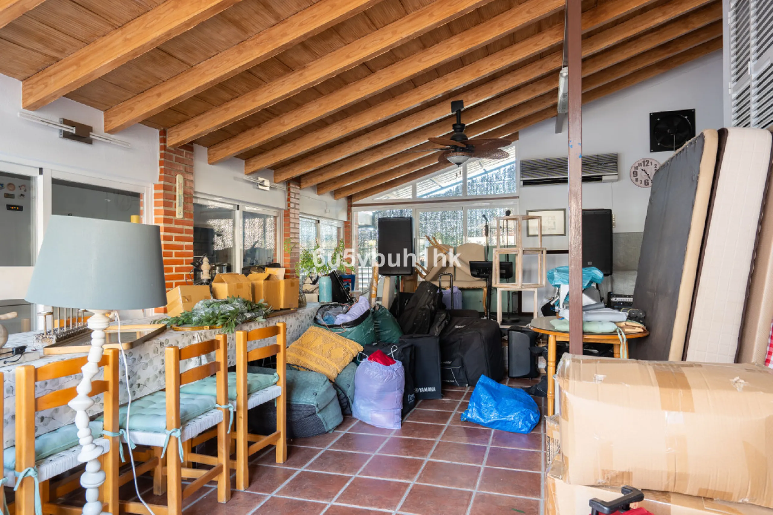 Discover a rare opportunity to own two beautifully designed homes combined on one generous plot in the heart of Vélez-Málaga — complete with private parking, a swimming pool, extensive entertainment areas, and a substantial commercial premise generating €