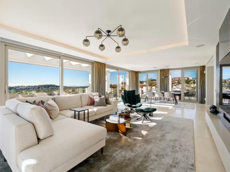 This exceptional duplex penthouse is located within the exclusive gated community of 9 Lions in Aloha, one of the most prestigious residential developments in Nueva Andalucía. Set in an elevated position, the property enjoys panoramic open views across th