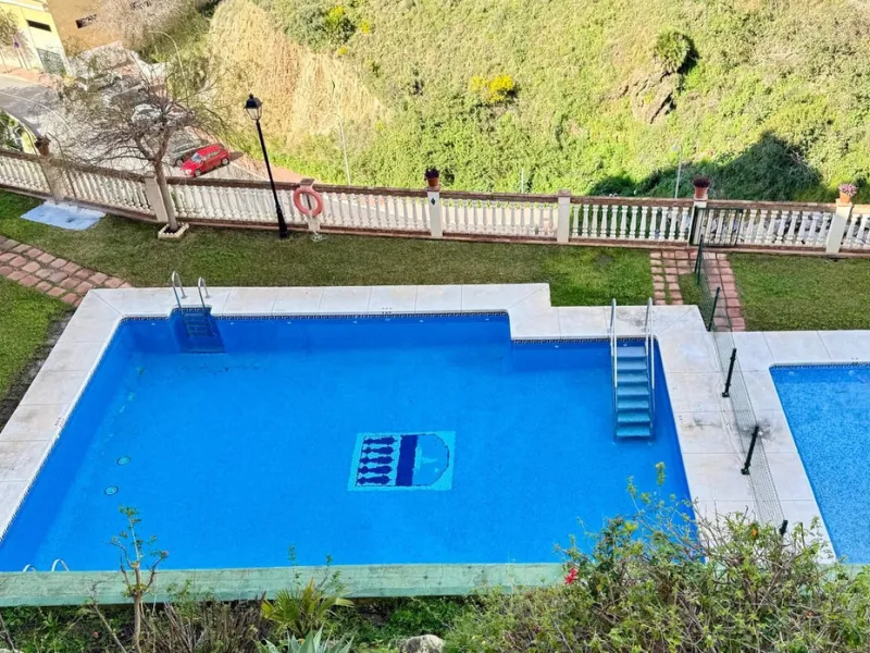 Here's a fantastic chance to own a charming two-bedroom apartment right near the beach of Carvajal.