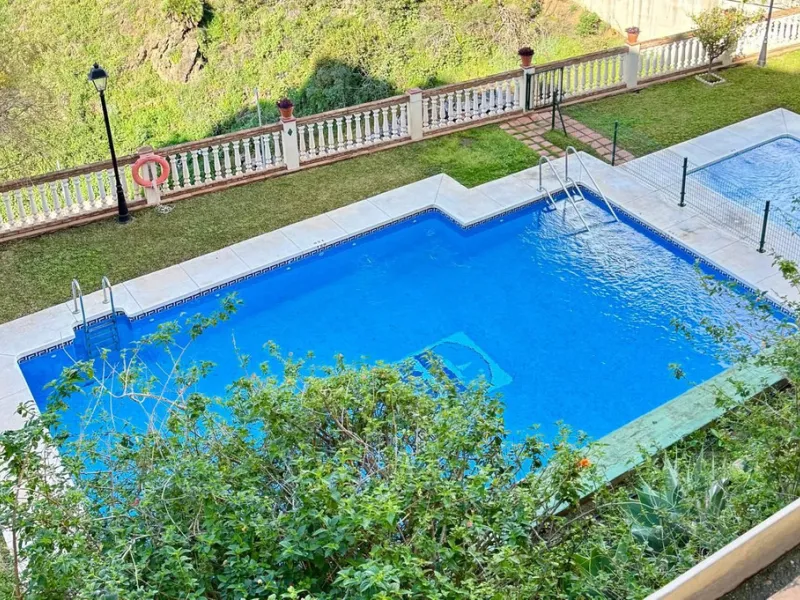 Here's a fantastic chance to own a charming two-bedroom apartment right near the beach of Carvajal.