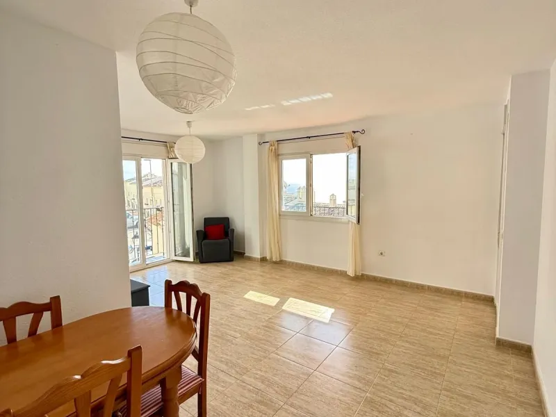 Here's a fantastic chance to own a charming two-bedroom apartment right near the beach of Carvajal.