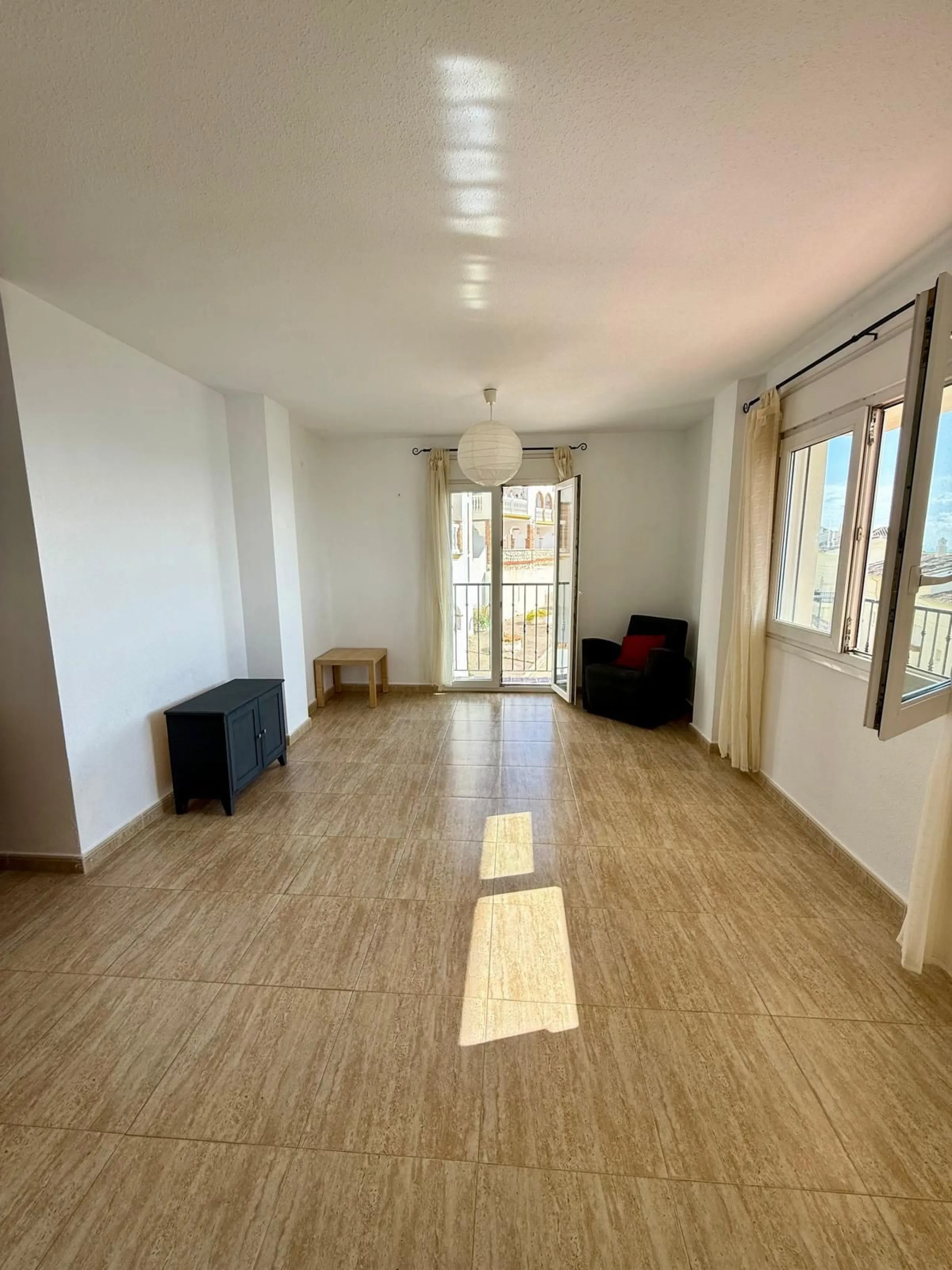 Here's a fantastic chance to own a charming two-bedroom apartment right near the beach of Carvajal.