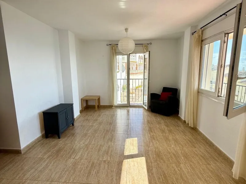 Here's a fantastic chance to own a charming two-bedroom apartment right near the beach of Carvajal.