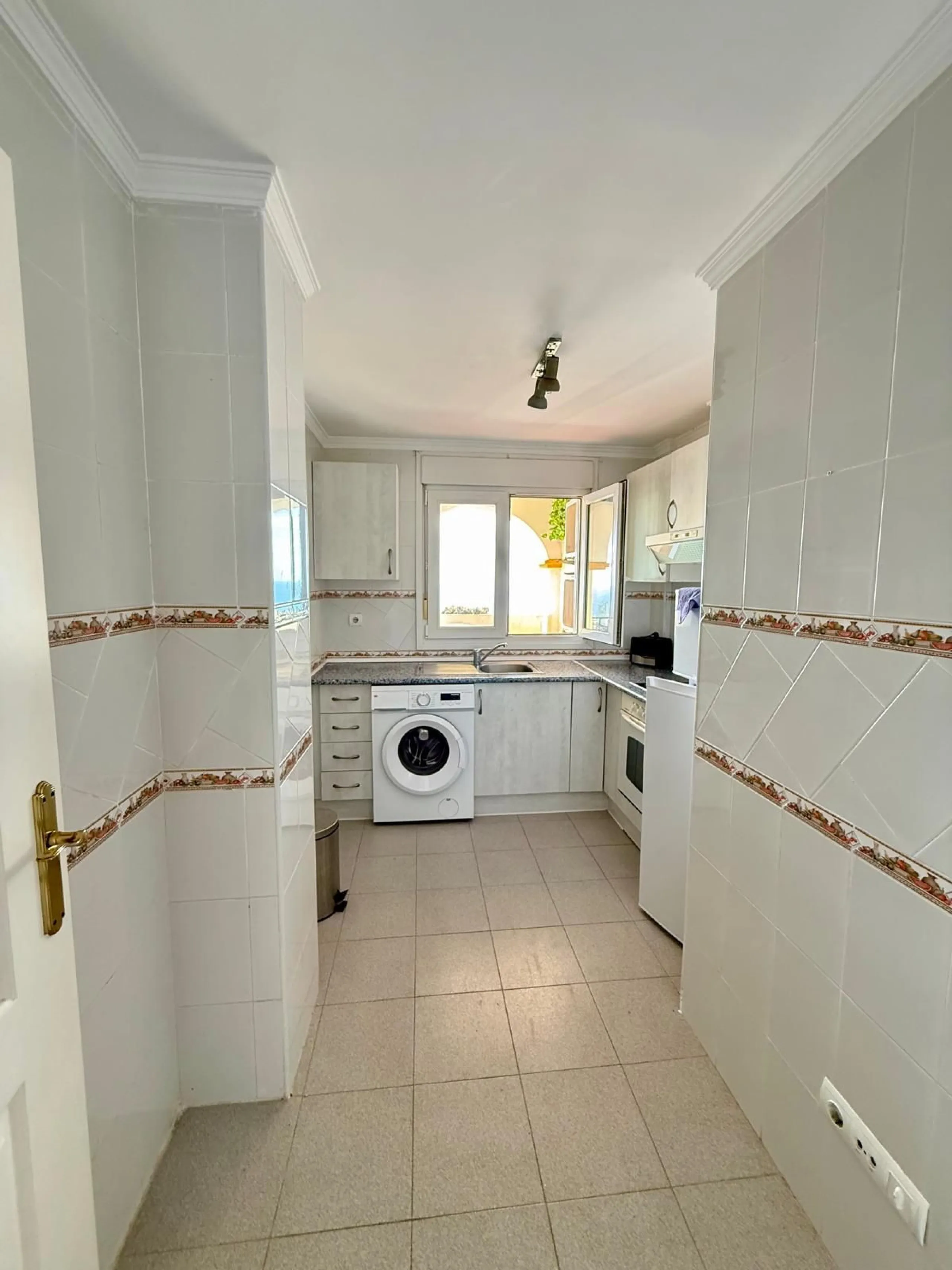 Here's a fantastic chance to own a charming two-bedroom apartment right near the beach of Carvajal.