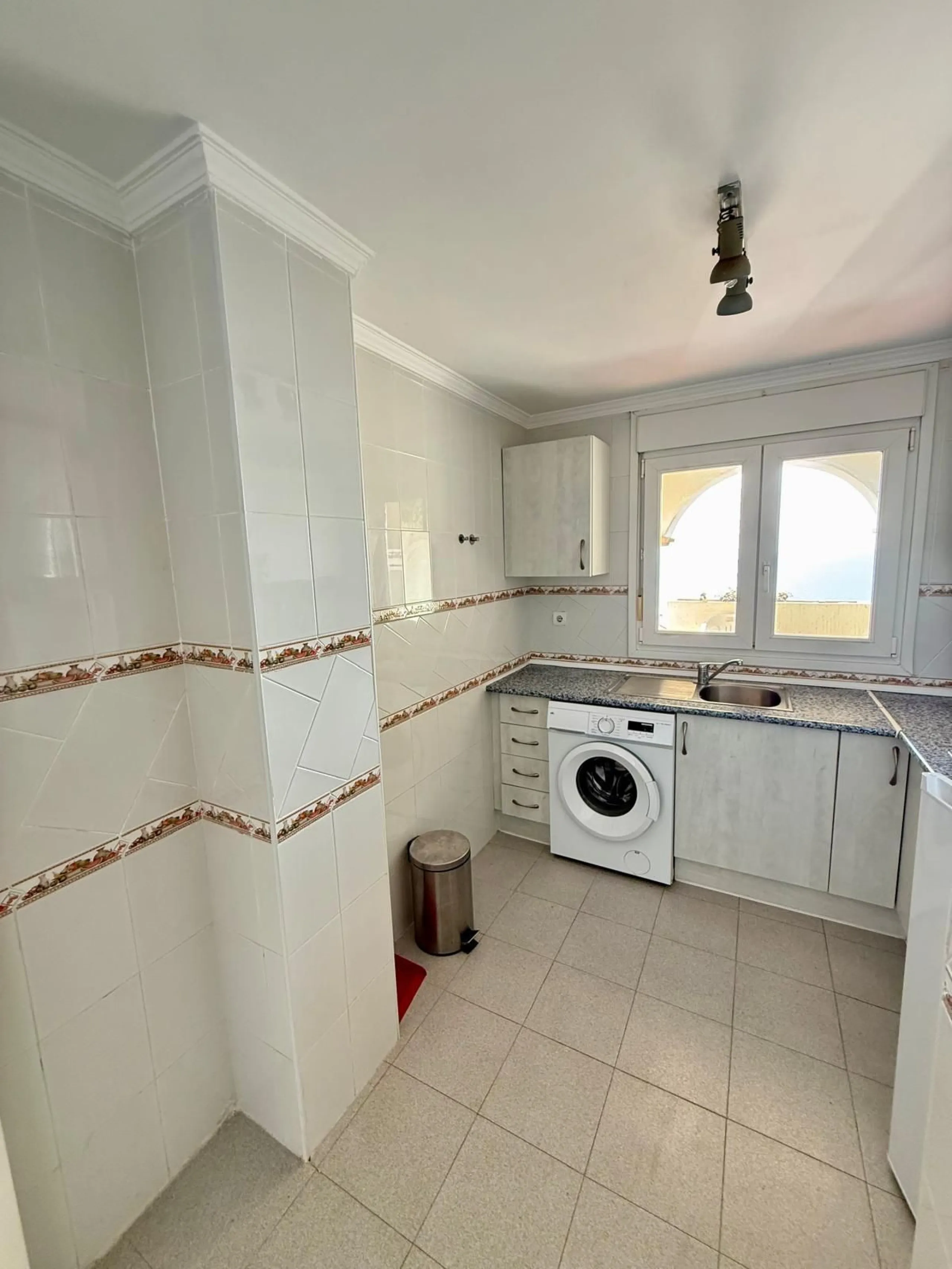 Here's a fantastic chance to own a charming two-bedroom apartment right near the beach of Carvajal.