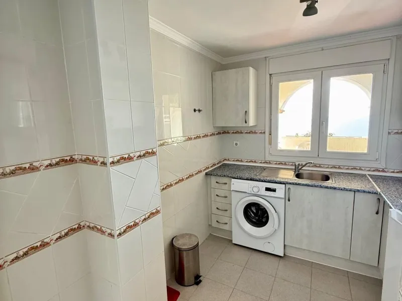 Here's a fantastic chance to own a charming two-bedroom apartment right near the beach of Carvajal.