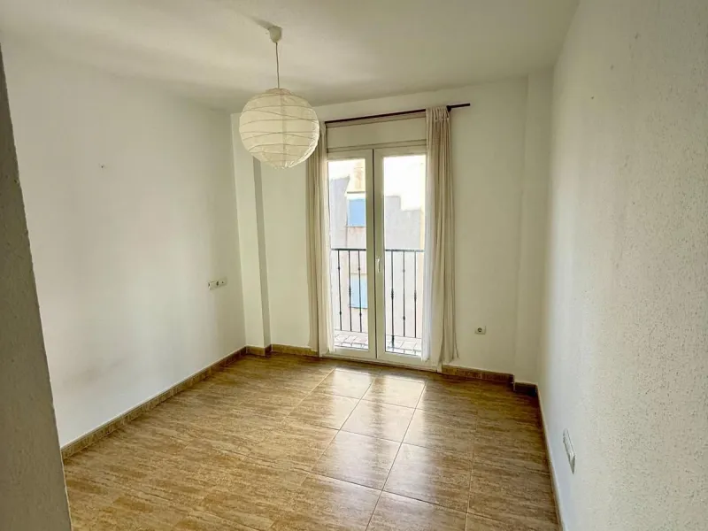 Here's a fantastic chance to own a charming two-bedroom apartment right near the beach of Carvajal.