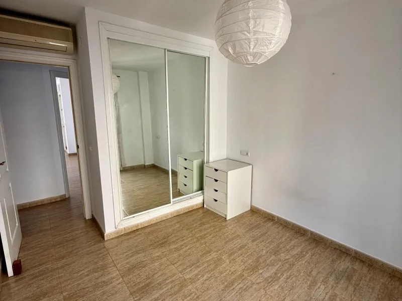 Here's a fantastic chance to own a charming two-bedroom apartment right near the beach of Carvajal.