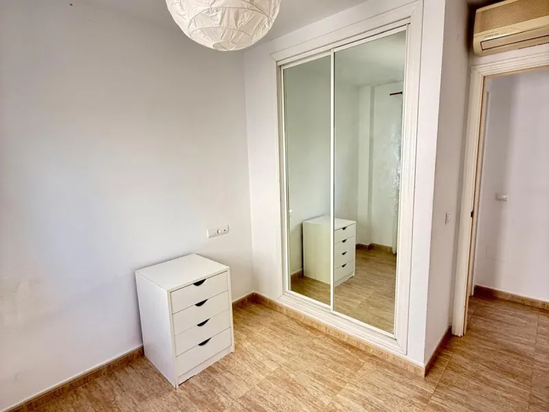 Here's a fantastic chance to own a charming two-bedroom apartment right near the beach of Carvajal.