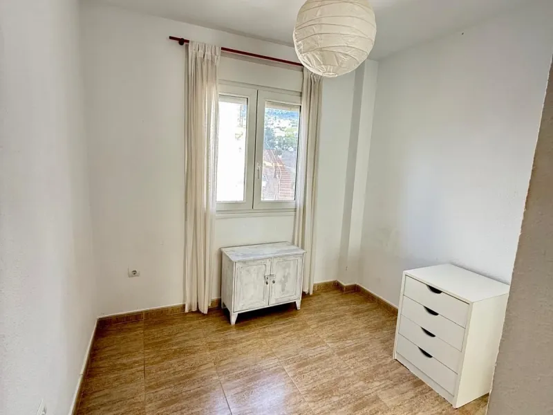 Here's a fantastic chance to own a charming two-bedroom apartment right near the beach of Carvajal.