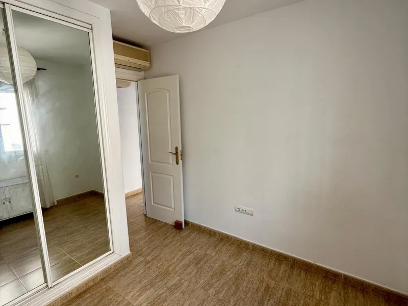Here's a fantastic chance to own a charming two-bedroom apartment right near the beach of Carvajal.