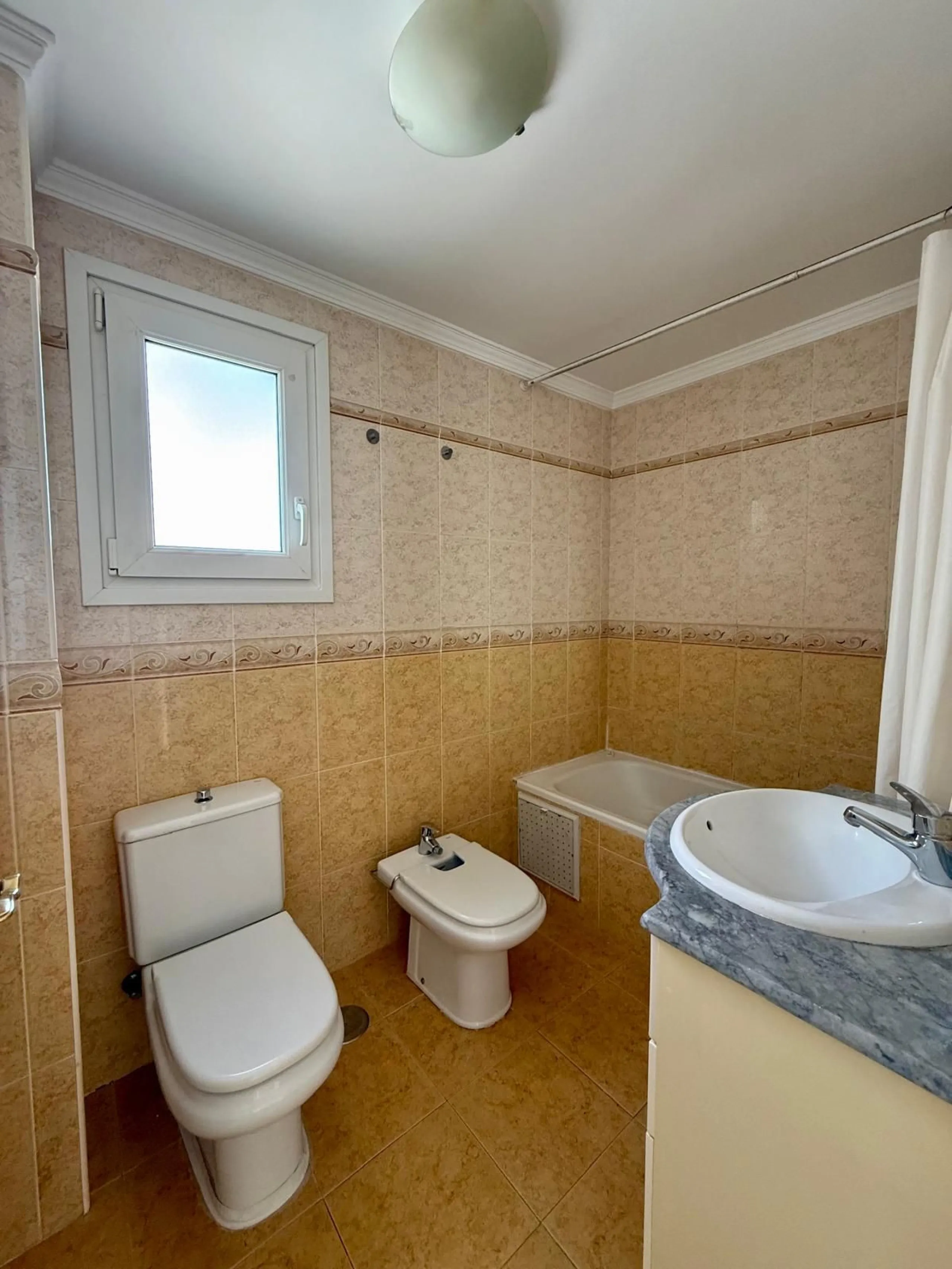 Here's a fantastic chance to own a charming two-bedroom apartment right near the beach of Carvajal.