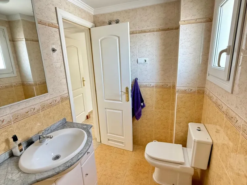 Here's a fantastic chance to own a charming two-bedroom apartment right near the beach of Carvajal.