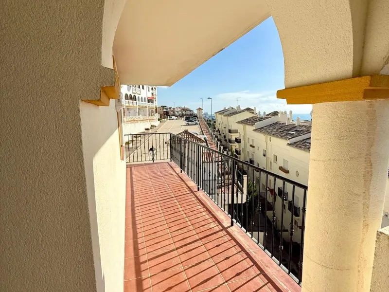 Here's a fantastic chance to own a charming two-bedroom apartment right near the beach of Carvajal.