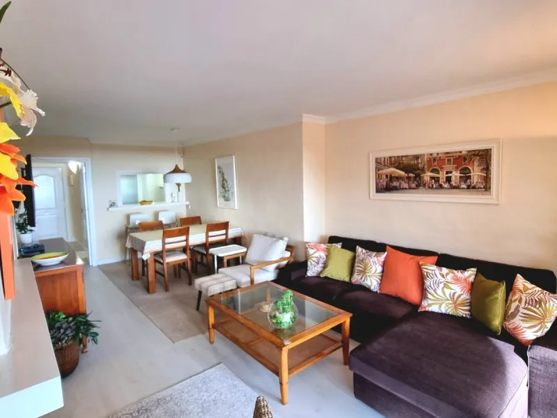 This inviting first‑floor apartment in the sought‑after El Porton community in Calahonda offers generous space, modern comfort and a wonderfully relaxed Mediterranean lifestyle. The home features two bedrooms and two bathrooms, including a main bedroom wi