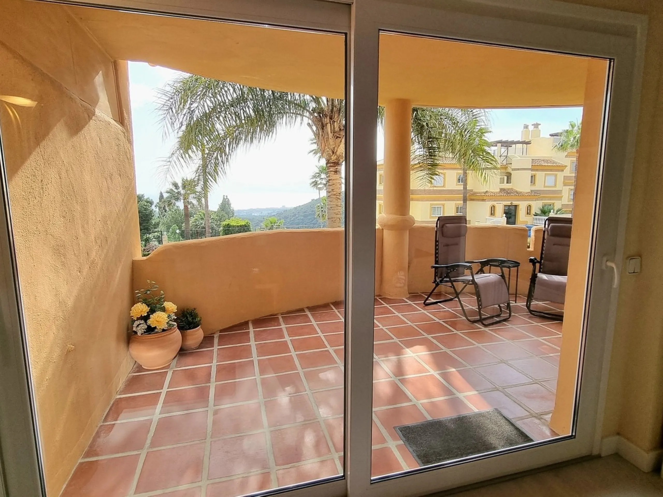 This inviting first‑floor apartment in the sought‑after El Porton community in Calahonda offers generous space, modern comfort and a wonderfully relaxed Mediterranean lifestyle. The home features two bedrooms and two bathrooms, including a main bedroom wi