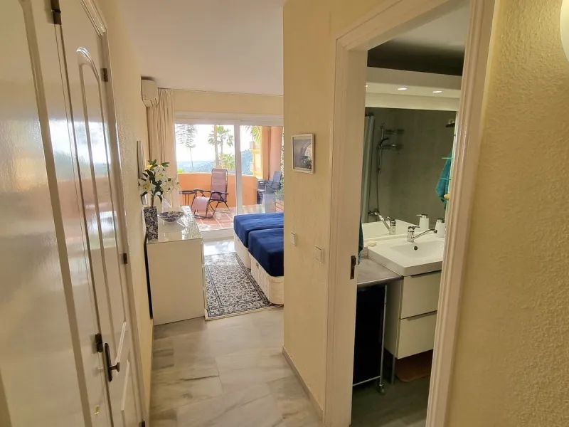 This inviting first‑floor apartment in the sought‑after El Porton community in Calahonda offers generous space, modern comfort and a wonderfully relaxed Mediterranean lifestyle. The home features two bedrooms and two bathrooms, including a main bedroom wi