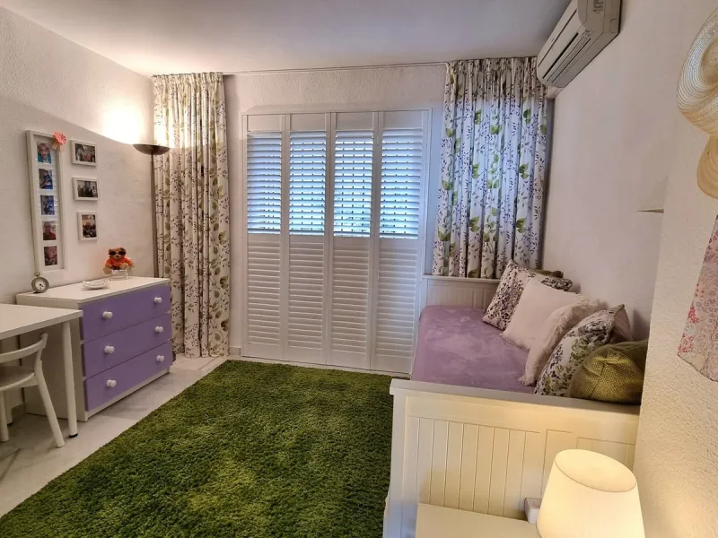 This inviting first‑floor apartment in the sought‑after El Porton community in Calahonda offers generous space, modern comfort and a wonderfully relaxed Mediterranean lifestyle. The home features two bedrooms and two bathrooms, including a main bedroom wi