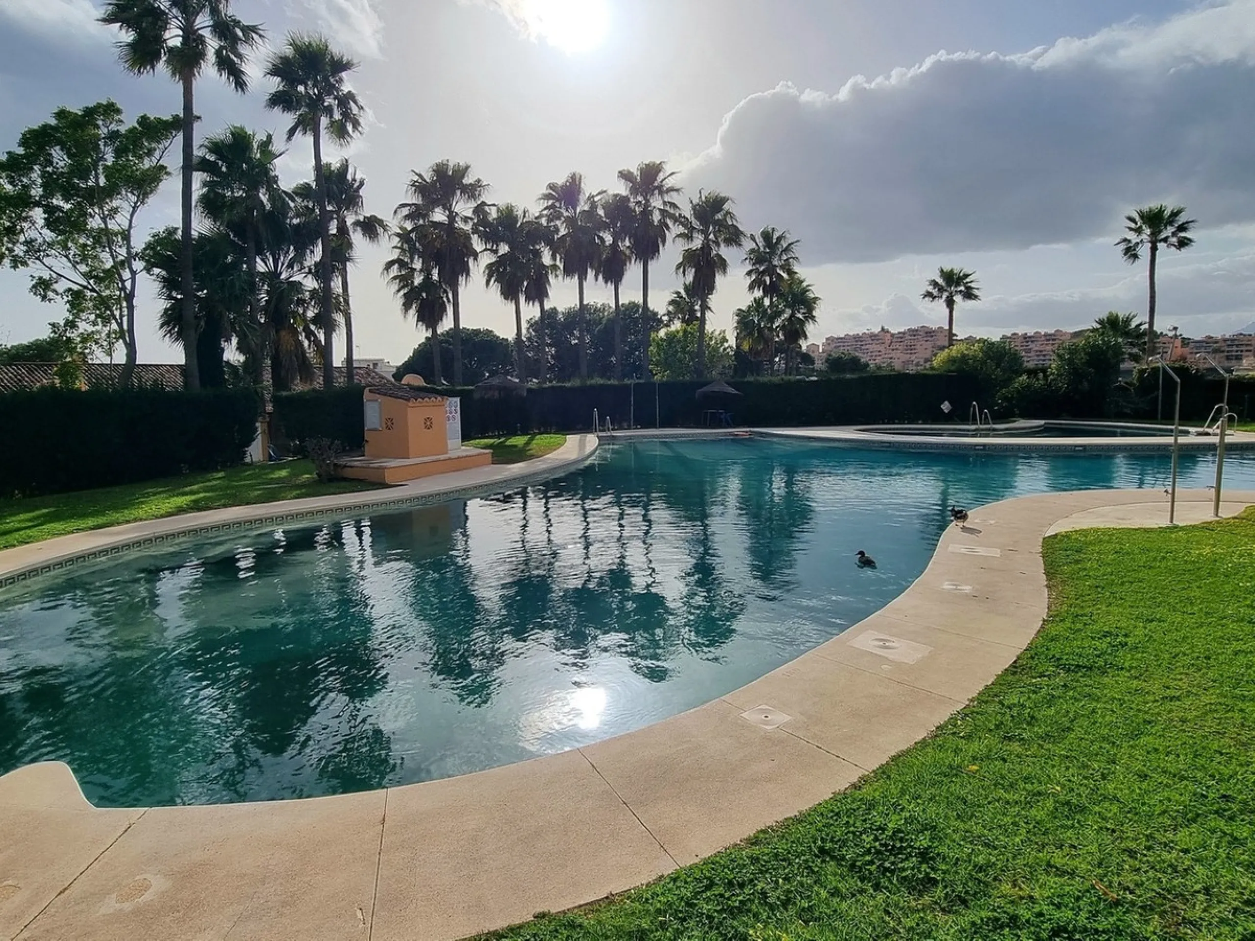 This inviting first‑floor apartment in the sought‑after El Porton community in Calahonda offers generous space, modern comfort and a wonderfully relaxed Mediterranean lifestyle. The home features two bedrooms and two bathrooms, including a main bedroom wi