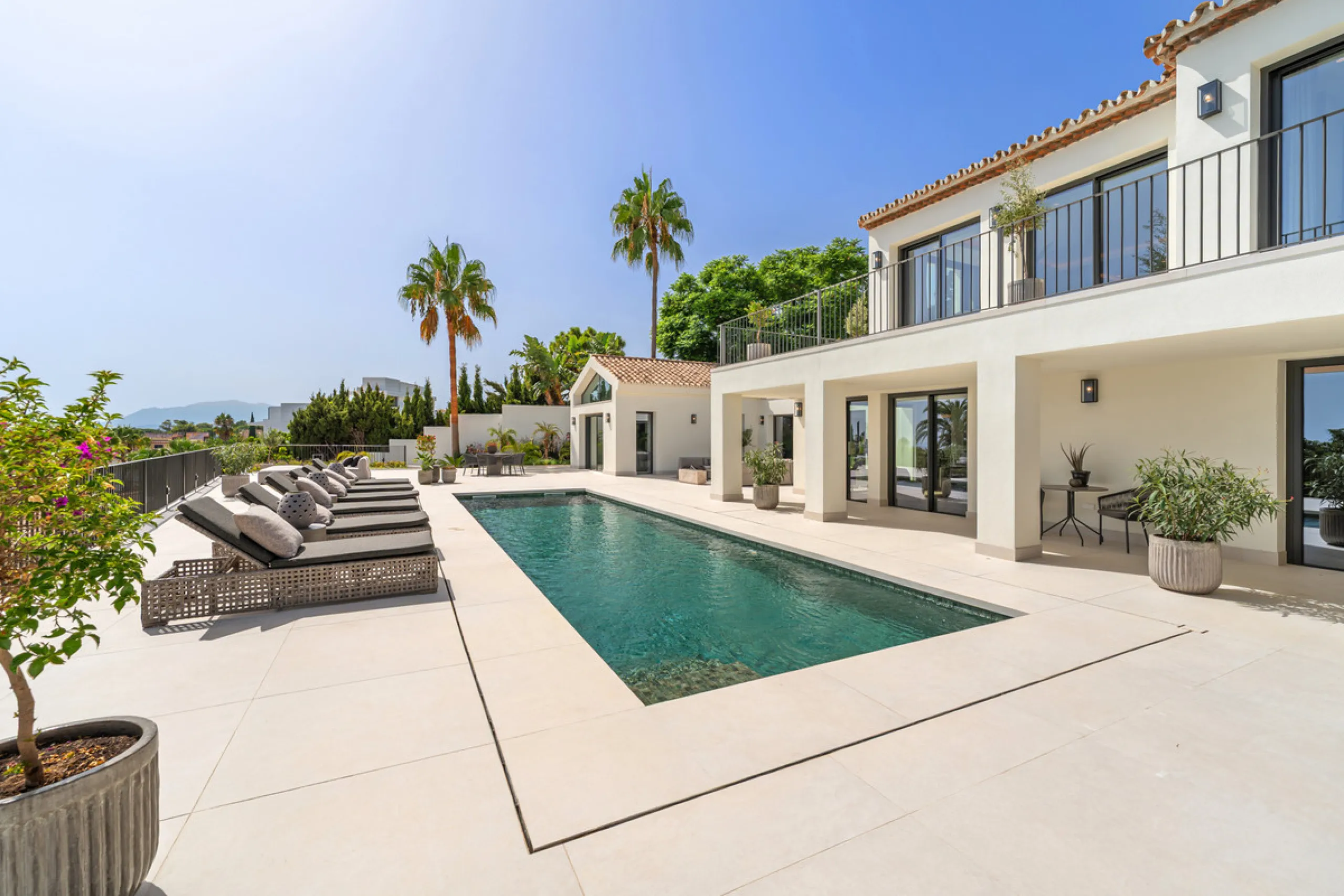 Villa Rocío is a fully renovated Andalusian-style residence located in Rocío de Nagüeles on Marbella's prestigious Golden Mile. Set on a 1,965m² south-facing plot beneath La Concha, the property enjoys open views of the Mediterranean. Modernised in 2025, 