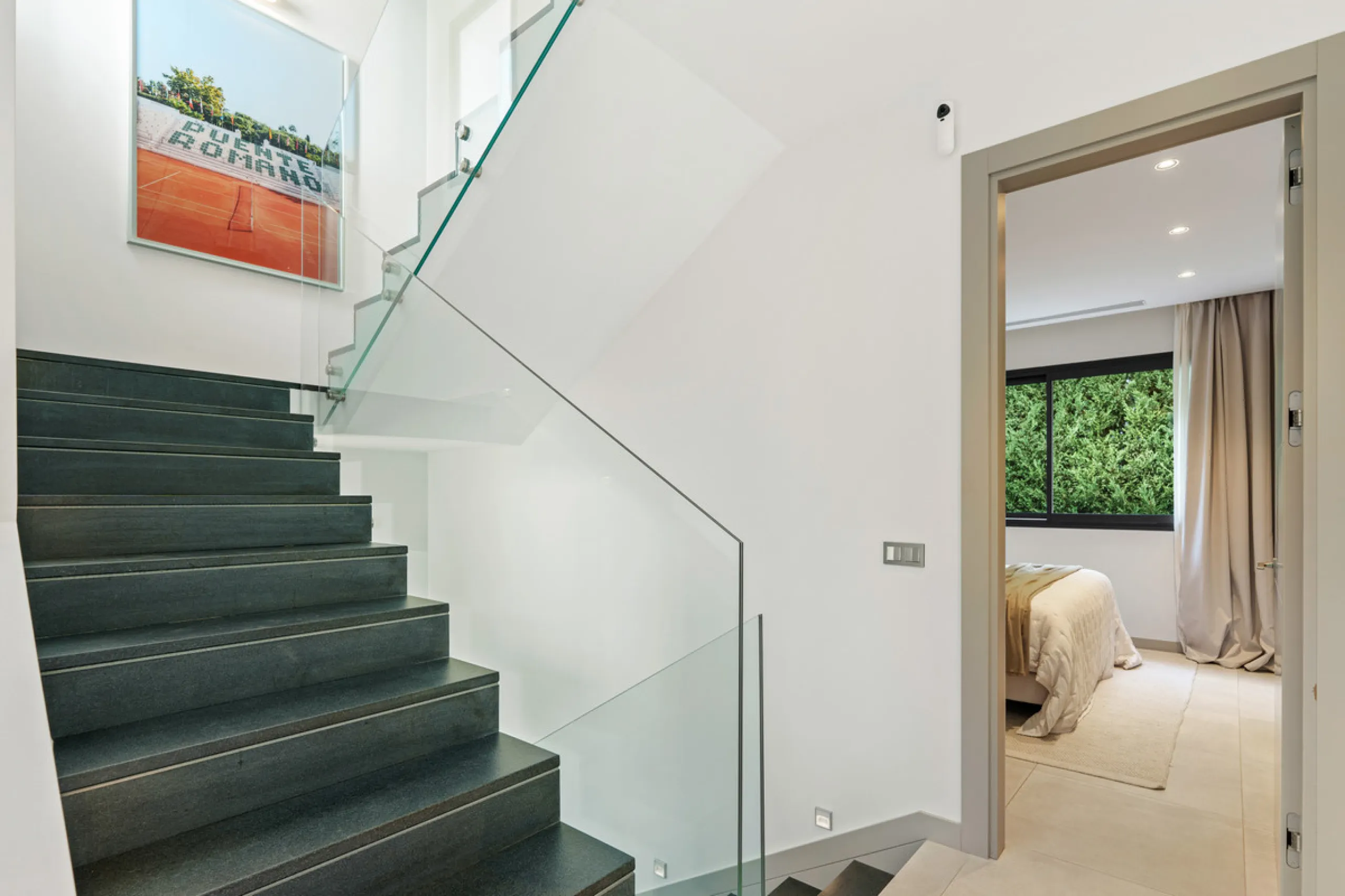 Located in the sought-after area of Nueva Andalucía, just minutes from Puerto Banús, Villa Jardin is a beautifully presented contemporary villa combining style, comfort, and functionality. The home features open-plan living areas with large sliding doors 