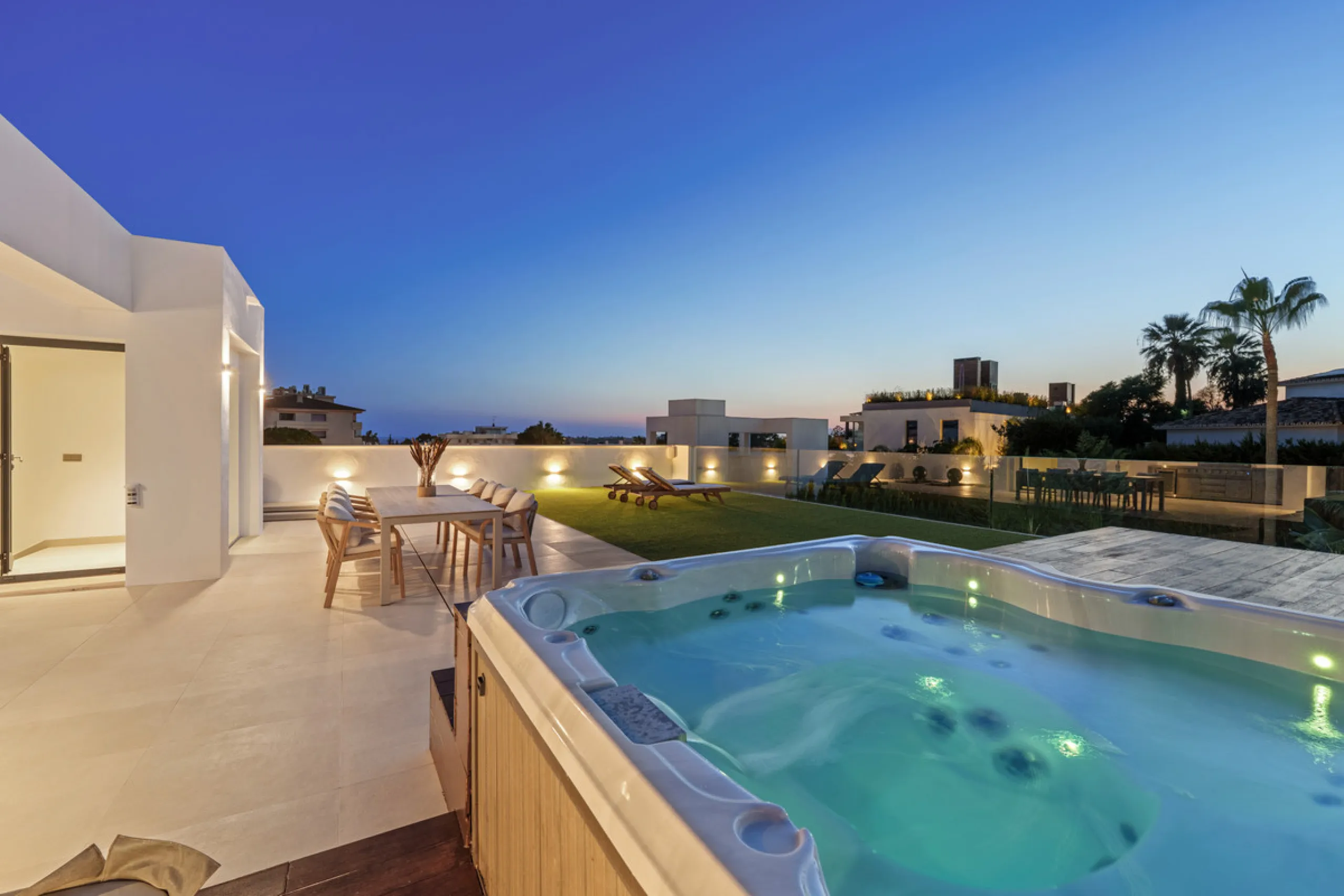 Located in the sought-after area of Nueva Andalucía, just minutes from Puerto Banús, Villa Jardin is a beautifully presented contemporary villa combining style, comfort, and functionality. The home features open-plan living areas with large sliding doors 