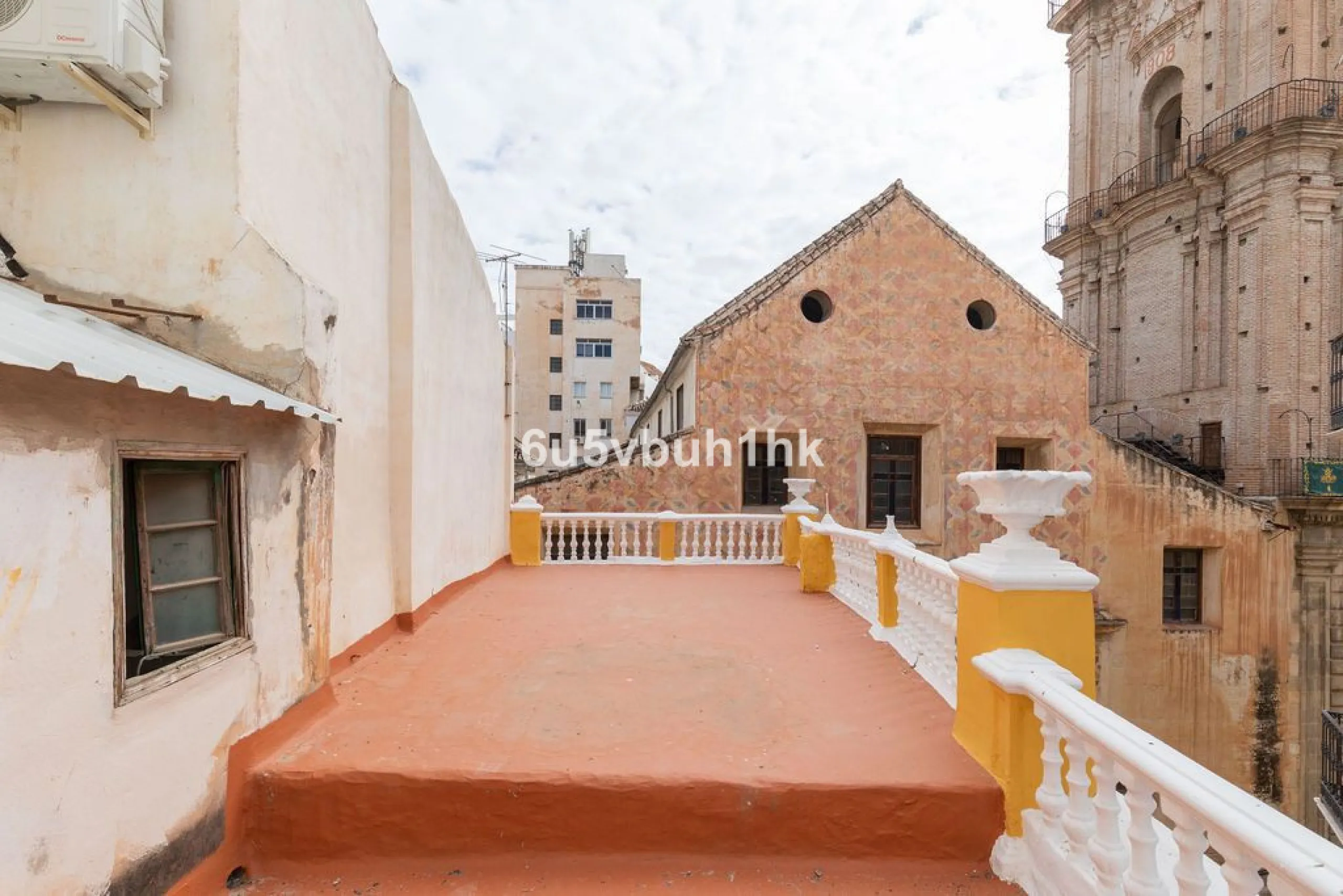 Located on one of the most picturesque streets in Málaga's historic centre, Calle San Juan, this characterful building offers a rare combination of immediate income and exceptional development potential. With its rooftop overlooking the magnificent tower 