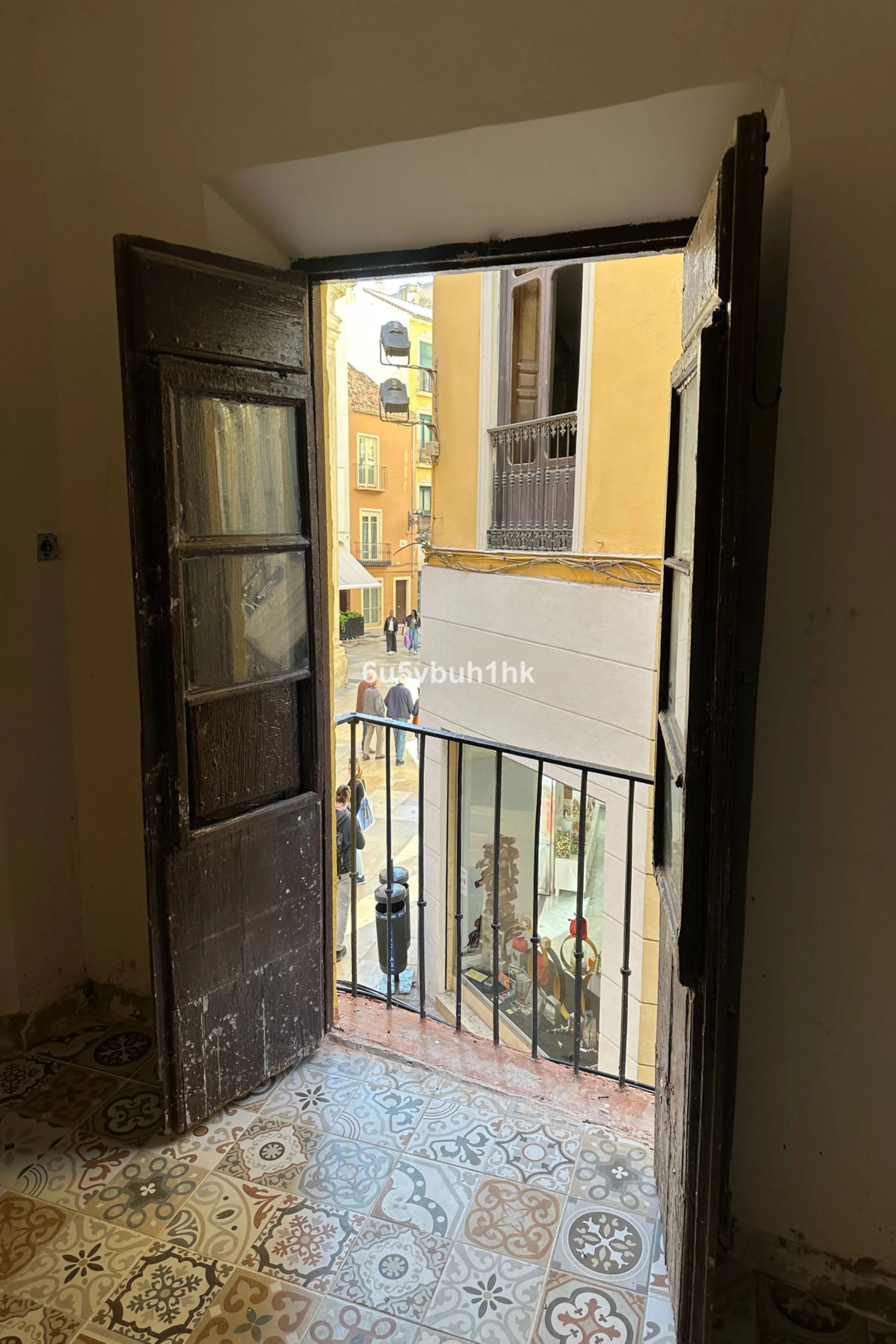 Located on one of the most picturesque streets in Málaga's historic centre, Calle San Juan, this characterful building offers a rare combination of immediate income and exceptional development potential. With its rooftop overlooking the magnificent tower 