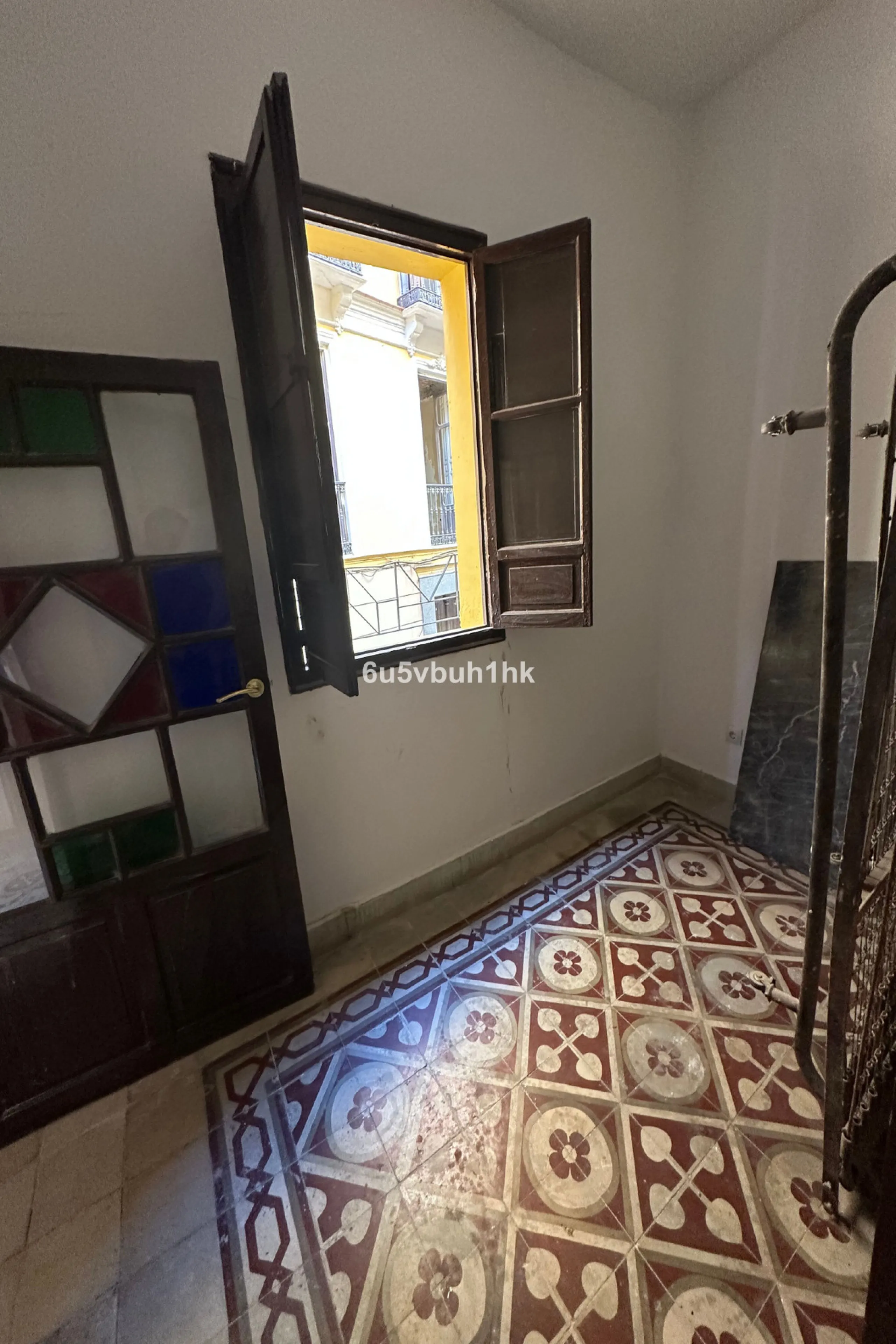 Located on one of the most picturesque streets in Málaga's historic centre, Calle San Juan, this characterful building offers a rare combination of immediate income and exceptional development potential. With its rooftop overlooking the magnificent tower 