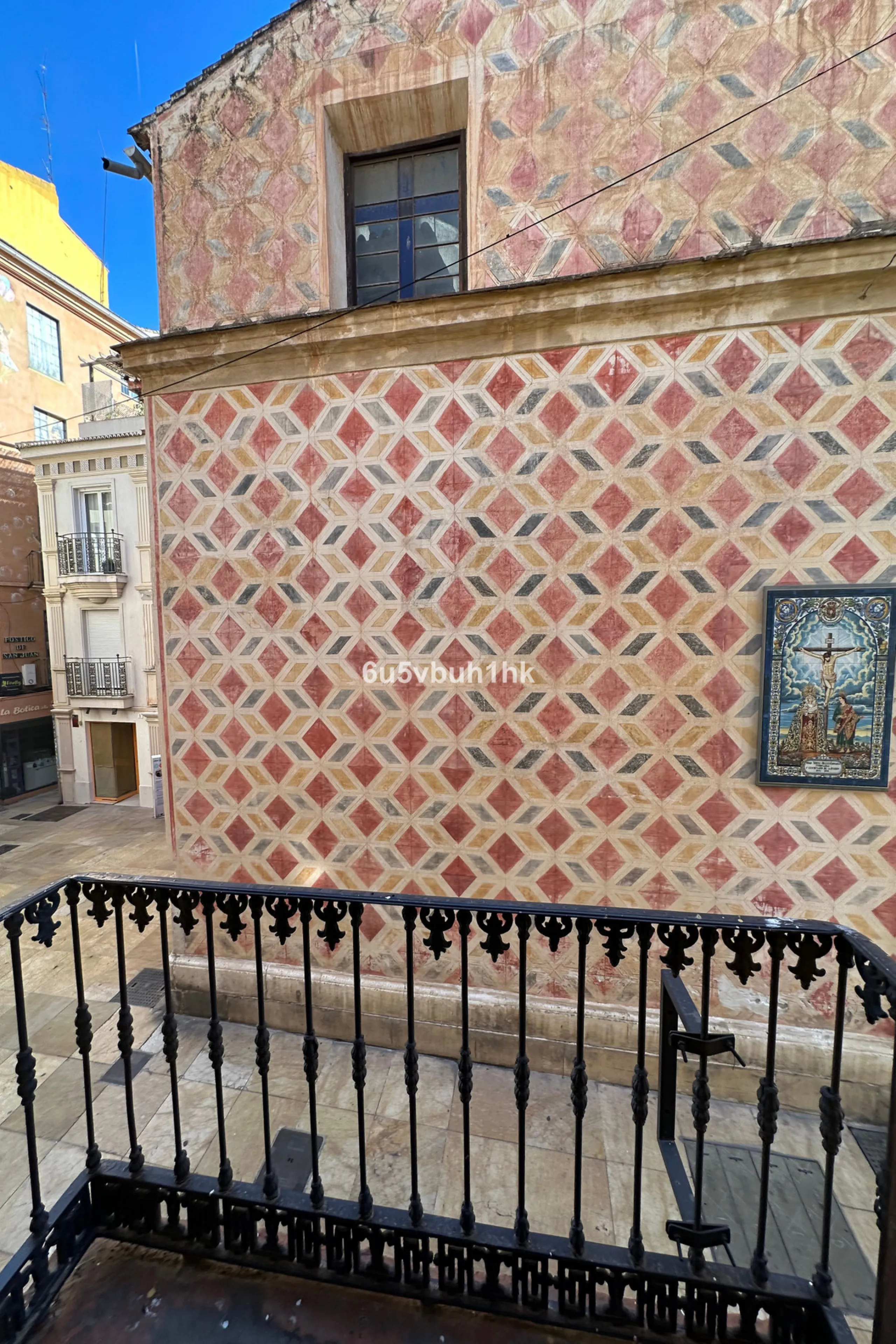Located on one of the most picturesque streets in Málaga's historic centre, Calle San Juan, this characterful building offers a rare combination of immediate income and exceptional development potential. With its rooftop overlooking the magnificent tower 
