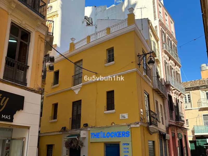 Located on one of the most picturesque streets in Málaga's historic centre, Calle San Juan, this characterful building offers a rare combination of immediate income and exceptional development potential. With its rooftop overlooking the magnificent tower 