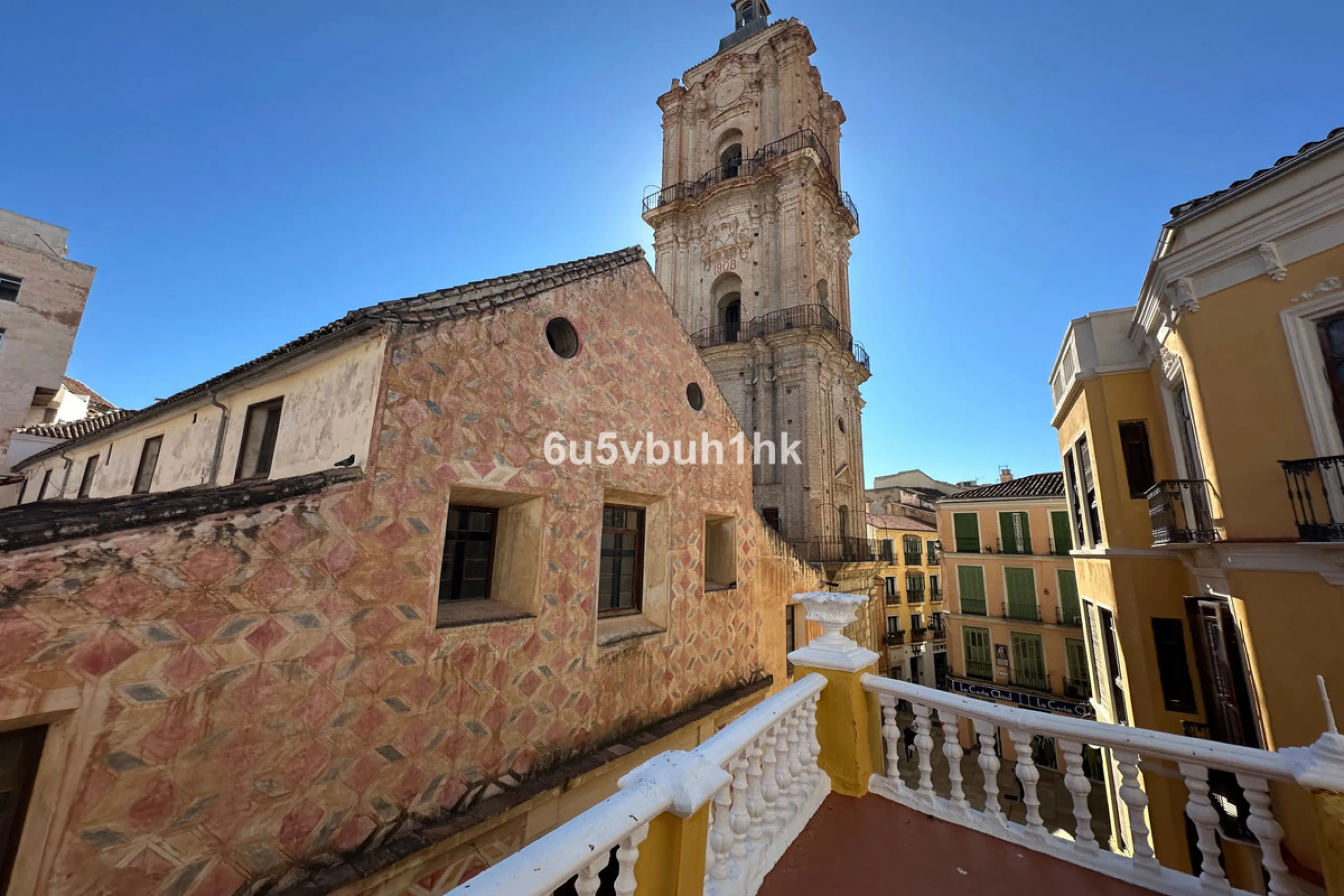 Located on one of the most picturesque streets in Málaga's historic centre, Calle San Juan, this characterful building offers a rare combination of immediate income and exceptional development potential. With its rooftop overlooking the magnificent tower 
