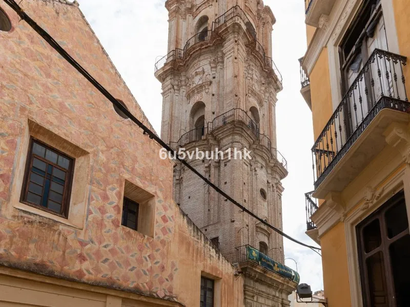 Located on one of the most picturesque streets in Málaga's historic centre, Calle San Juan, this characterful building offers a rare combination of immediate income and exceptional development potential. With its rooftop overlooking the magnificent tower 