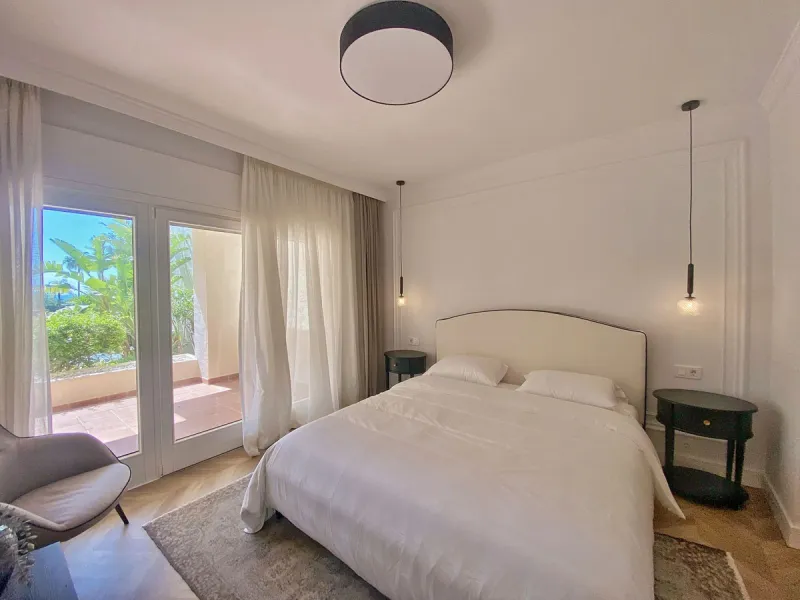 This gorgeous apartment is located in the upmarket urbanisation Bahia del Velerin - frontline beach, right on the beautiful paseo maritimo, meters away from the sea; with 24/7 security, underground parking, storage room, beautiful garden and swimming pool