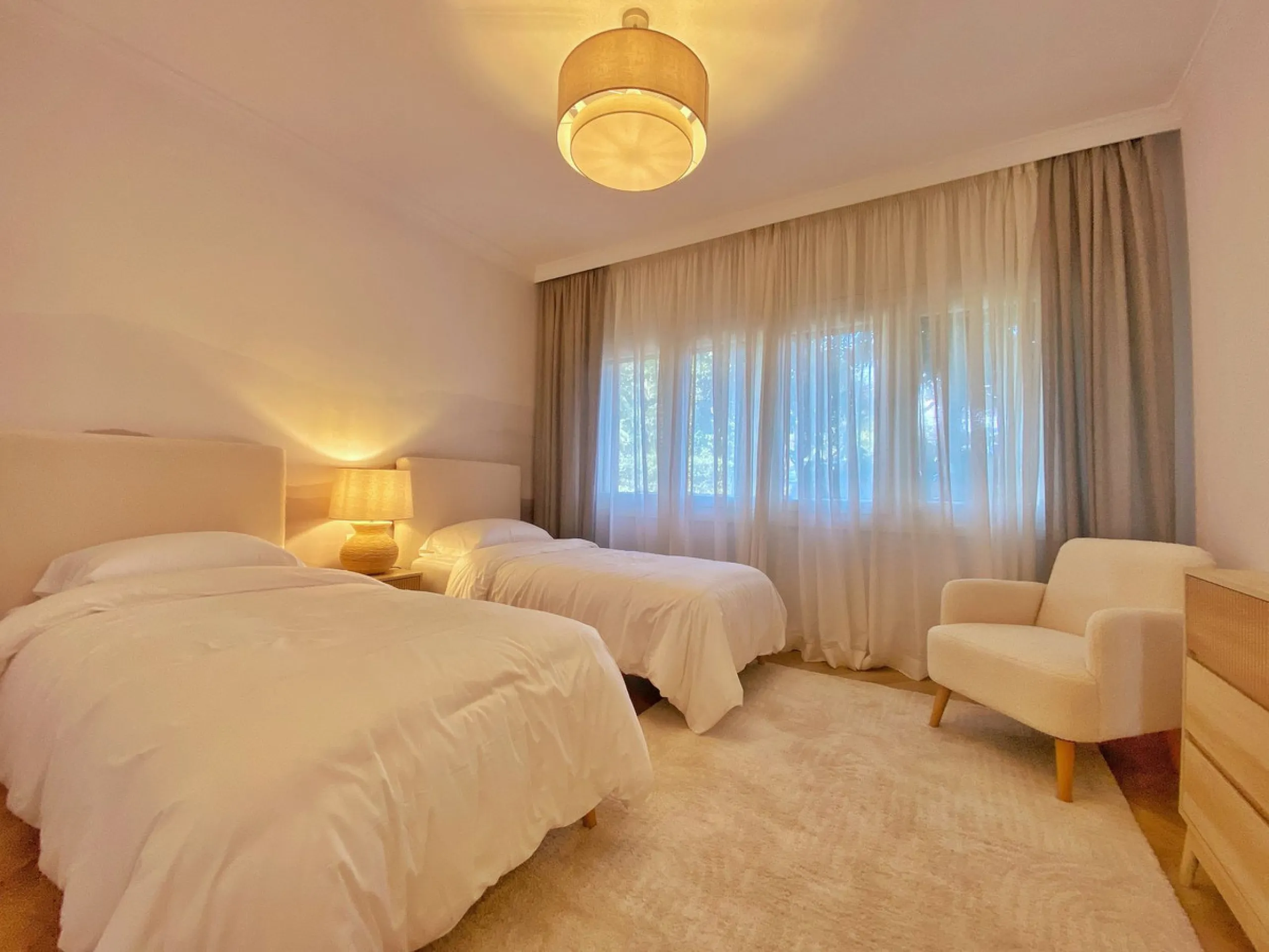 This gorgeous apartment is located in the upmarket urbanisation Bahia del Velerin - frontline beach, right on the beautiful paseo maritimo, meters away from the sea; with 24/7 security, underground parking, storage room, beautiful garden and swimming pool