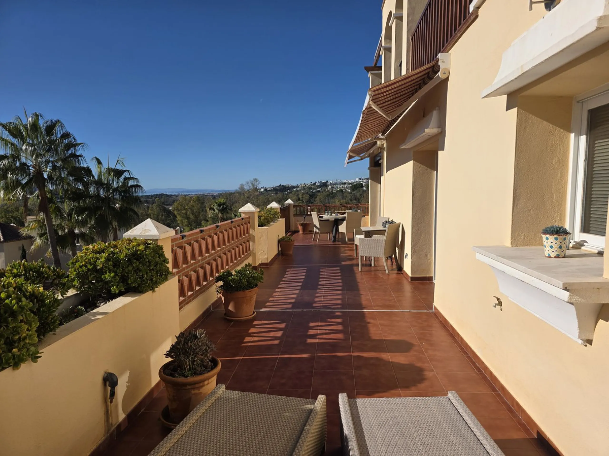 This beautiful apartment is the epitome of Marbella living: bright, spacious, plenty of outdoor space, 5 star resort amenities and stunning views. This corner apartment offers the most sensational views across the coastline and surrounding mountainside fr