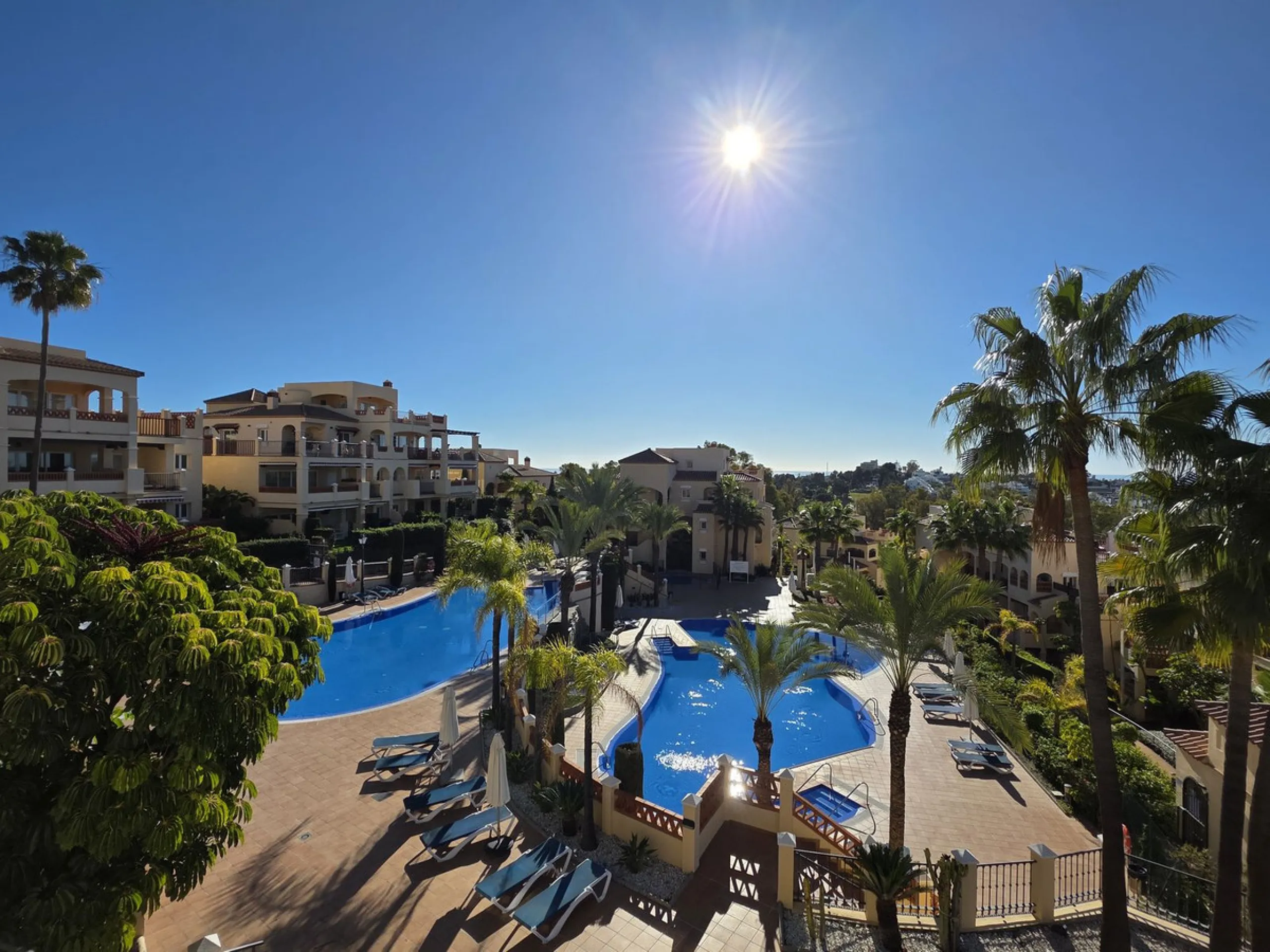 This beautiful apartment is the epitome of Marbella living: bright, spacious, plenty of outdoor space, 5 star resort amenities and stunning views. This corner apartment offers the most sensational views across the coastline and surrounding mountainside fr