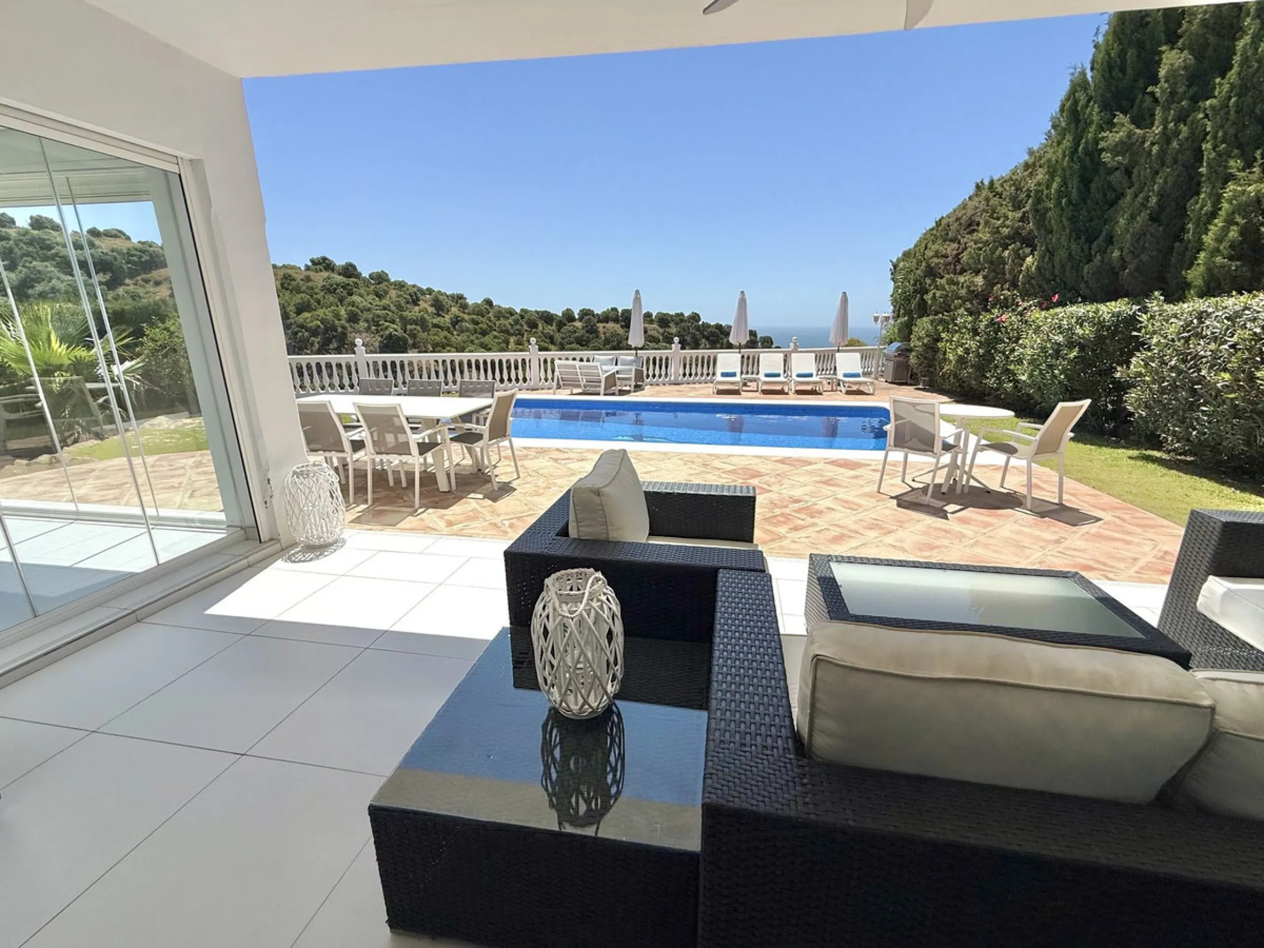 New Listing - Lovely 5 bed, 3.5 bath Villa on elevated plot in Upper Calahonda, offering beautiful panoramic views over tree-lined hillside down to the sea.