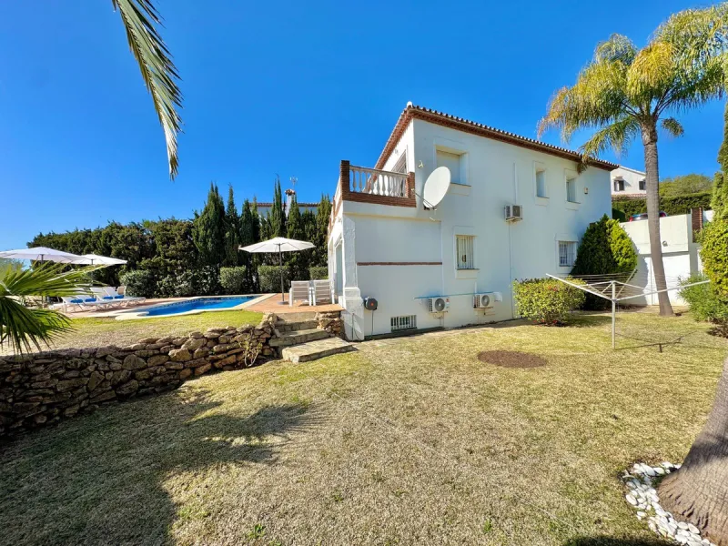 New Listing - Lovely 5 bed, 3.5 bath Villa on elevated plot in Upper Calahonda, offering beautiful panoramic views over tree-lined hillside down to the sea.